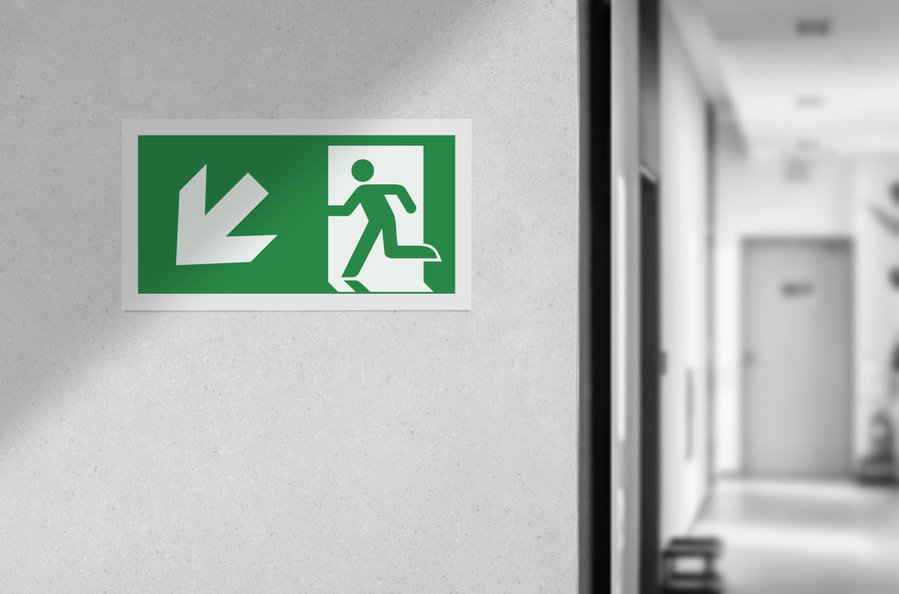 Fire Exit Sign In The Corridor Of The Building