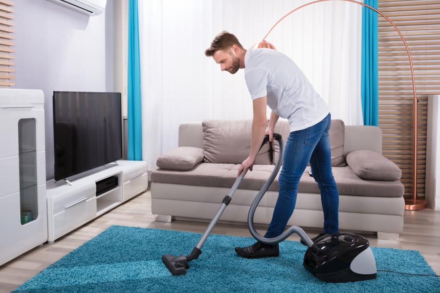 Man Using Vacuum