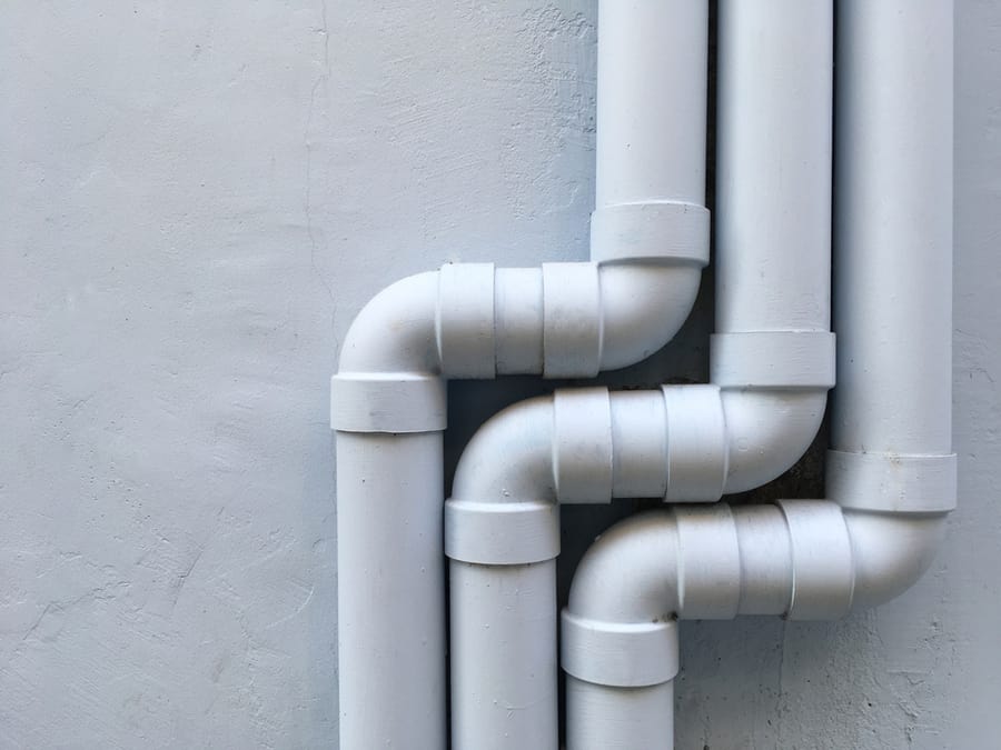 White Pipes On The Gray Wall