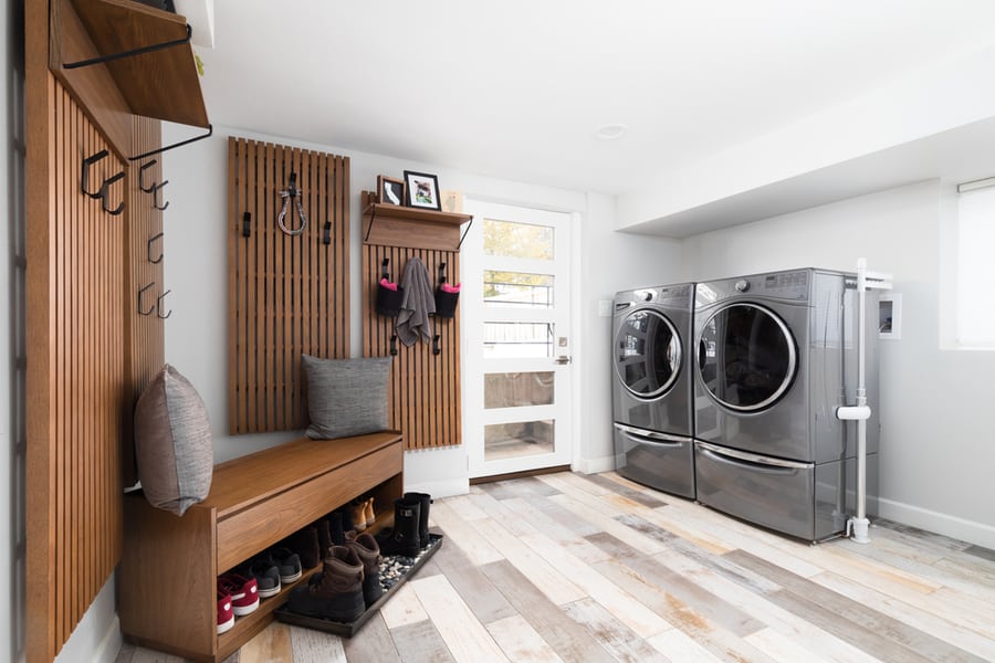 A Renovated Laundry Room And Mud Room With Whirlpool Washer And Dryer