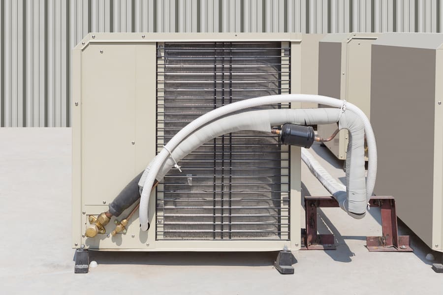 Air Compressor Or Air Condenser Unit Located On Support Outside Building To Heat Released Transferred To Surrounding Environment, Compressor Is Part Of Cooling Function And Air Conditioning Hvac Syste