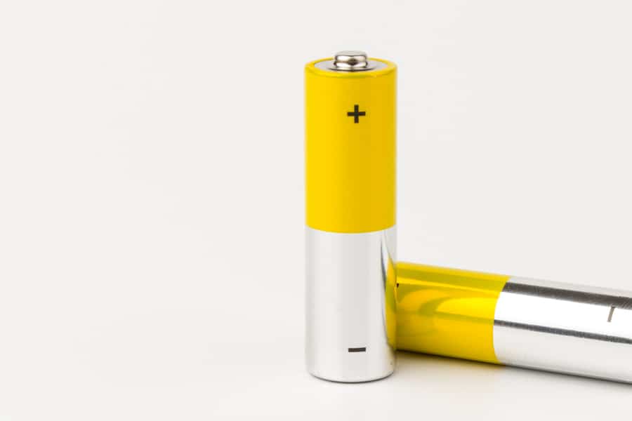 Composition With Alkaline Batteries On White Background