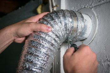 Flexible Dryer Vent Hose, Attaching/Detaching From Wall Vent By Turning Screw In Steel Duct Clamp.
