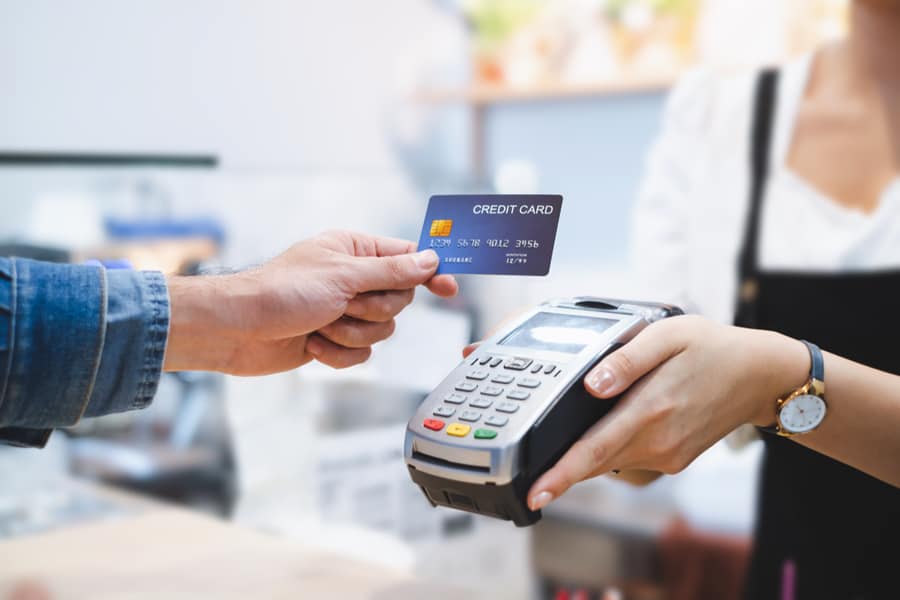 Man Paying His Purchase Through Credit Card