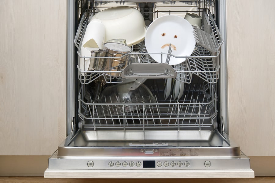 Poorly Washed Dishes In The Dishwasher.