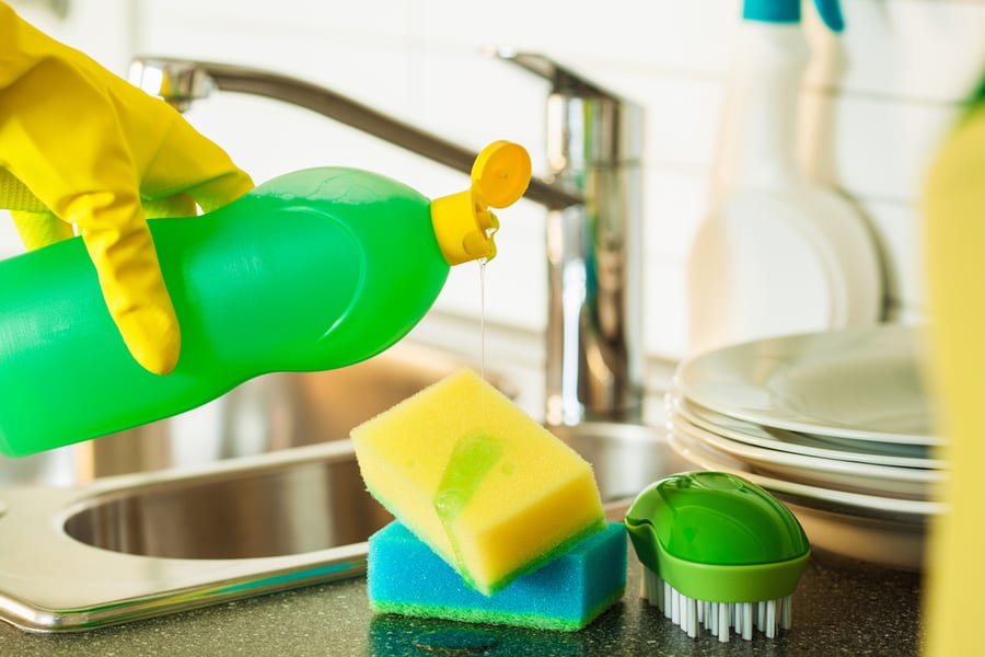 Pouring Dishwashing Liquid On Sponge Kitchen Wash Cleaning