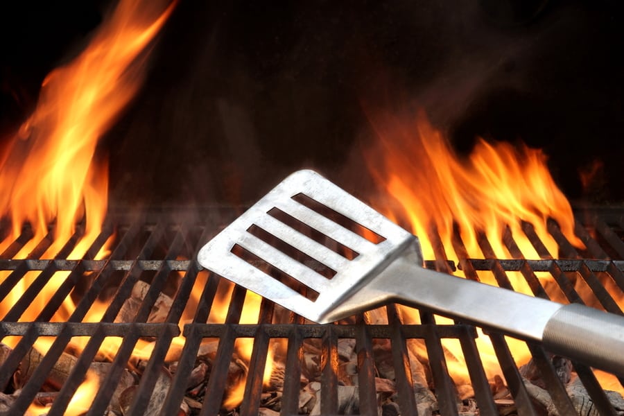 Spatula On The Barbecue Charcoal Fire Grill With Black Background