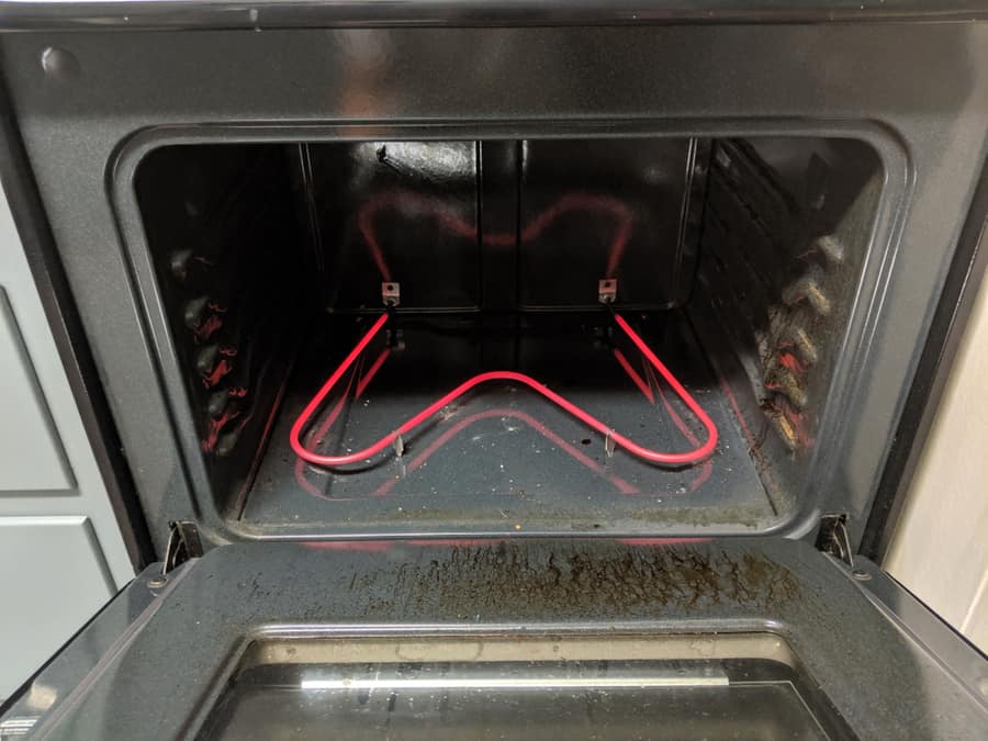 The Heating Elements On An Oven Heating Up Bright Red