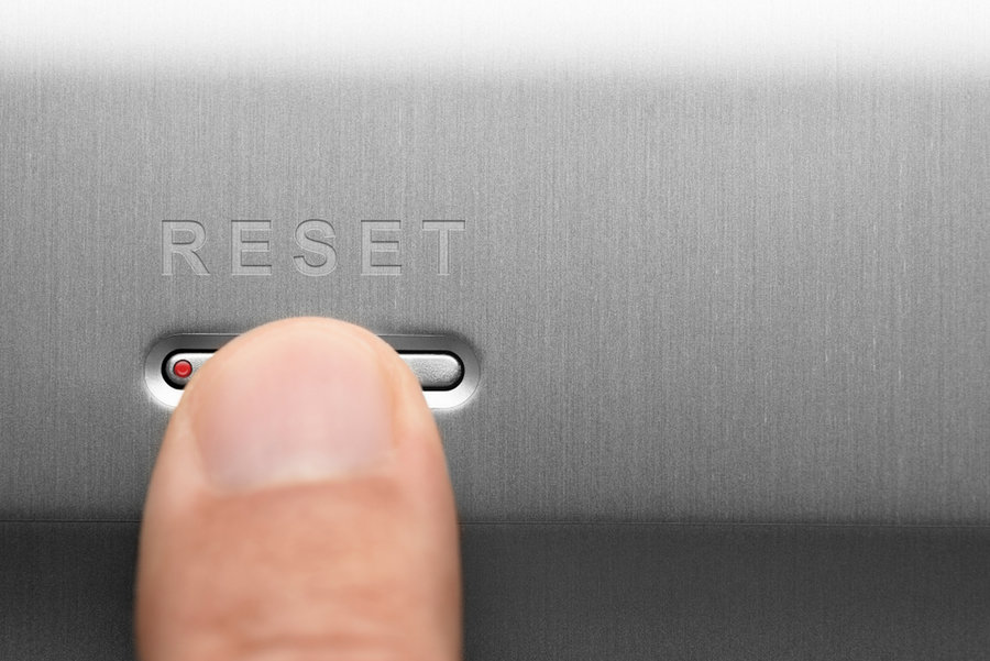 The Reset Button On The Aluminum Panel