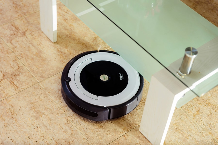 Vacuum Cleaner Robot. Household Cleaning Concept. New Technologies.
