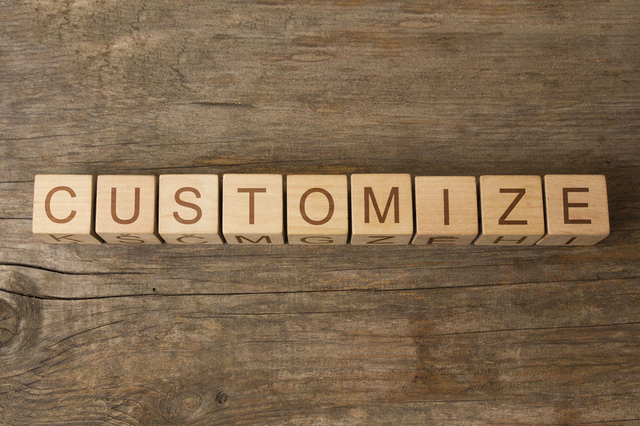Word Customize On Cubes On Wooden Background
