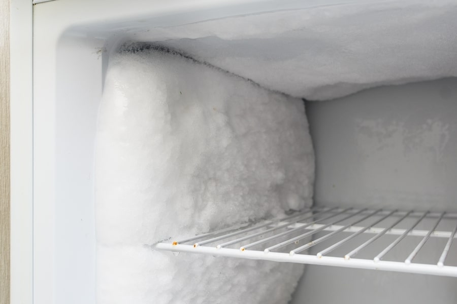 A Lot Of Frost And Ice In The Freezer Of The Refrigerator