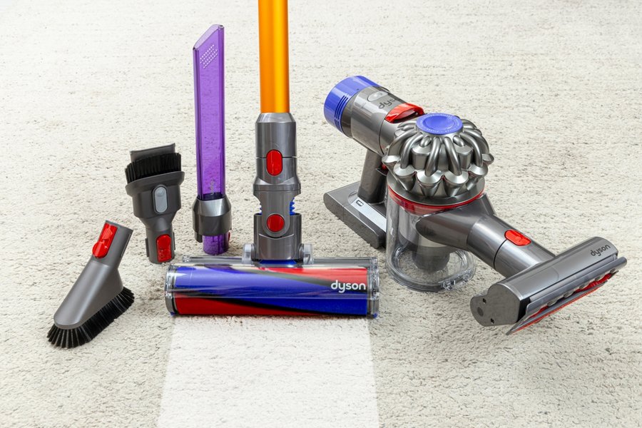 Accessories Of Dyson On A Carpet Background