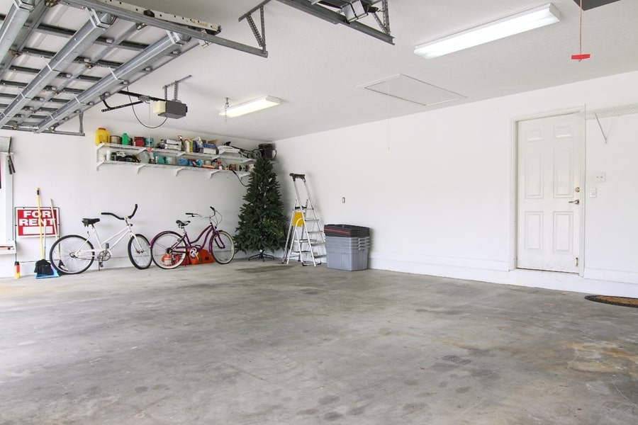 An Almost Empty Garage To Be Used As Storage For Junk That Will Be Collected Over The Years.