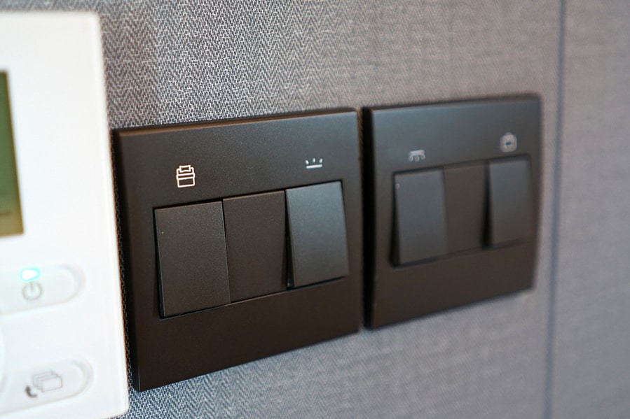 Close Up Black Indoor Switch Panel On The Wall