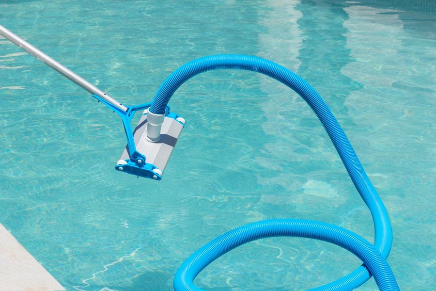 Close Up View Of Automatic Swimming Pool Cleaner Before Entering The Water With Water Background