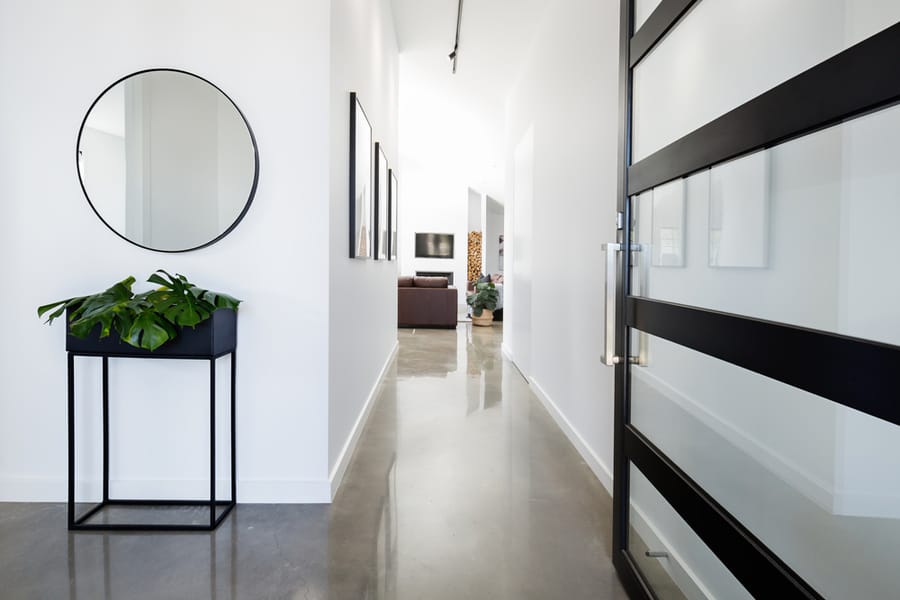 Contemporary Home Entry Hall With Polished Concrete Floors.