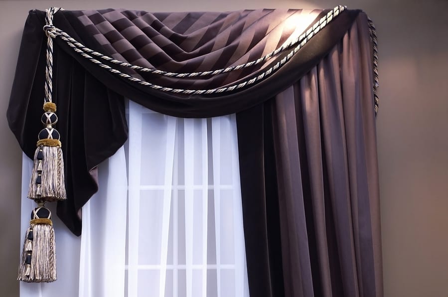 Drape The Curtains Over A Sheer Curtain Panel