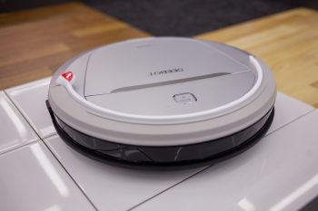 Electric Robot Vacuum Cleaner In On The Shelf