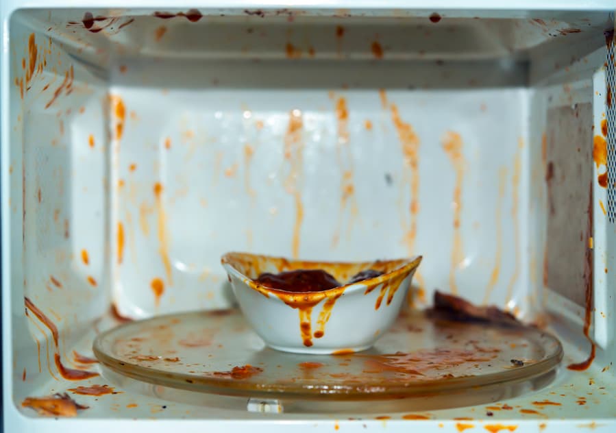 Food Exploded In Microwave Oven,Open Microwave. Dirt From Food Inside