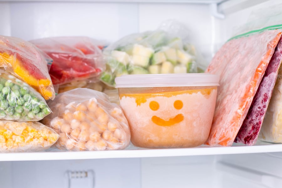 Frozen Food In The Freezer. Frozen Vegetables, Soup, Ready Meals In The Freezer.