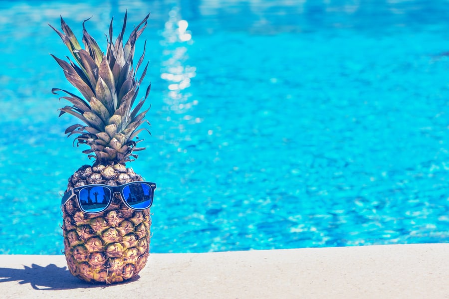 Funny Pineapple In Sunglasses Near Swimming Pool