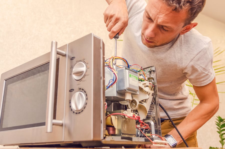 Master Man Repairs Microwave Oven
