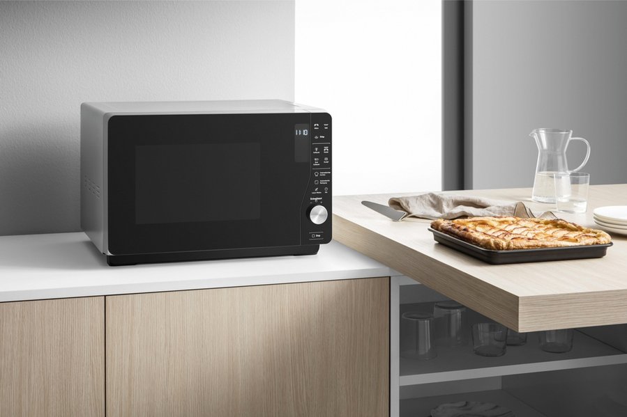 Modern Black Microwave Oven In The Kitchen