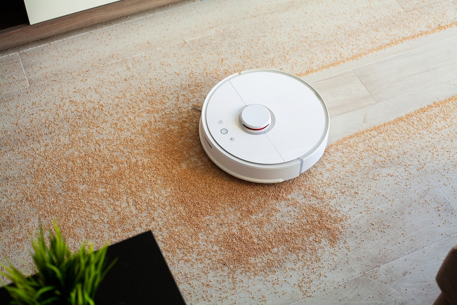Robot Vacuum Cleaner Performs Automatic Cleaning Of The Apartment