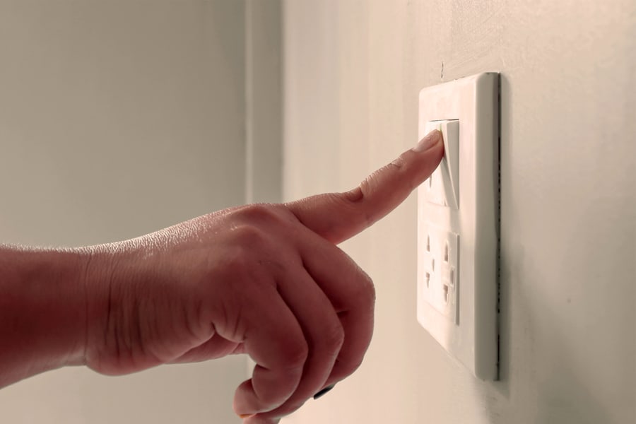 The Finger Is Pressing The Switch To Turn On Household Electrical Appliances