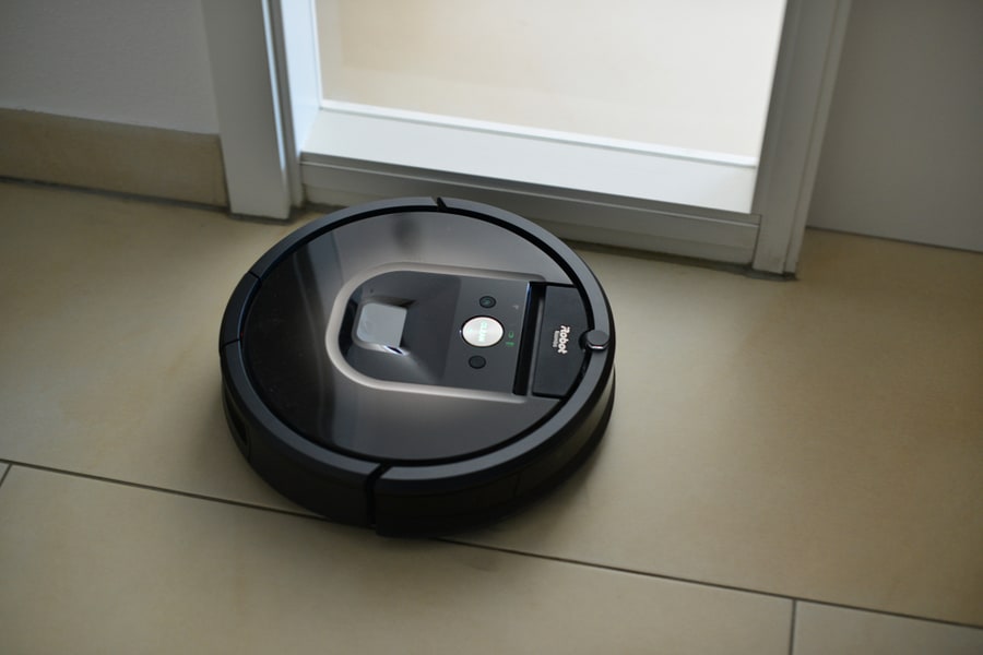 Vacuum Cleaner Robot From Irobot In Action. This Is The Model Roomba 980.