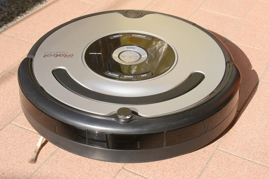 Witney, Oxfordshire, Uk 04 20 2010 A Roomba Robot Vacuum Cleaner.