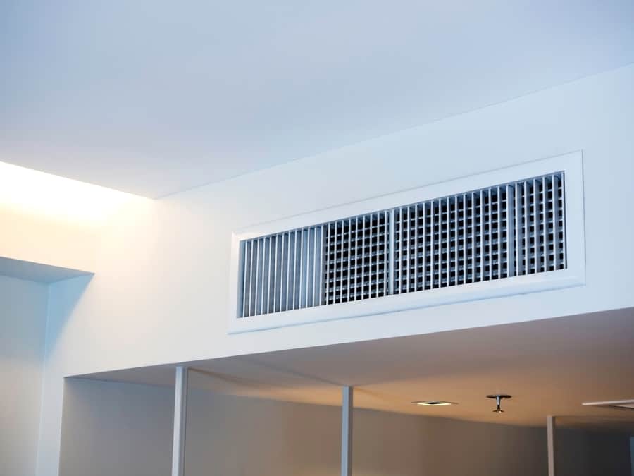 Air Conditioning Wall Mounted Ventilation System On Ceiling In The White Hotel Room