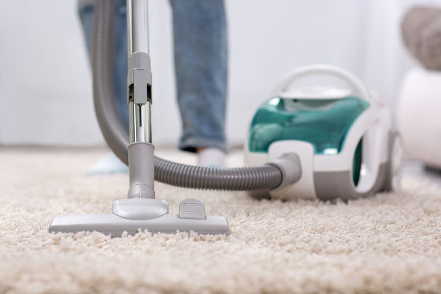 Cleaning Carpet With Vaccum Cleaner
