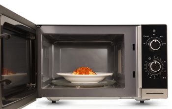 Close Up Microwave Oven Is Warm Chicken Spaghetti