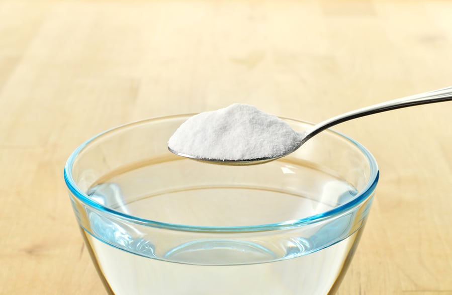 Close-Up Of Baking Soda On Spoon