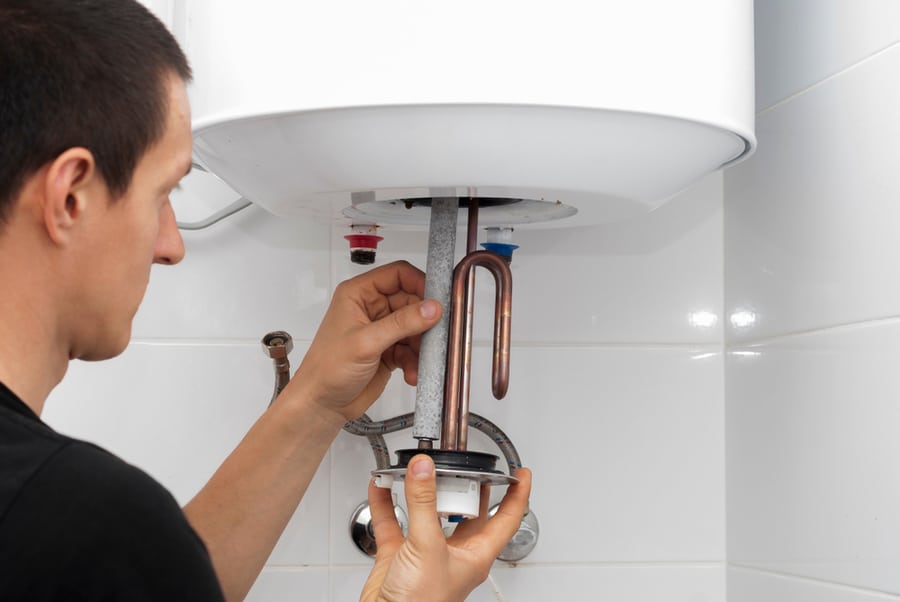 Master Installs A New Electric Heating Ten In A Water Tank