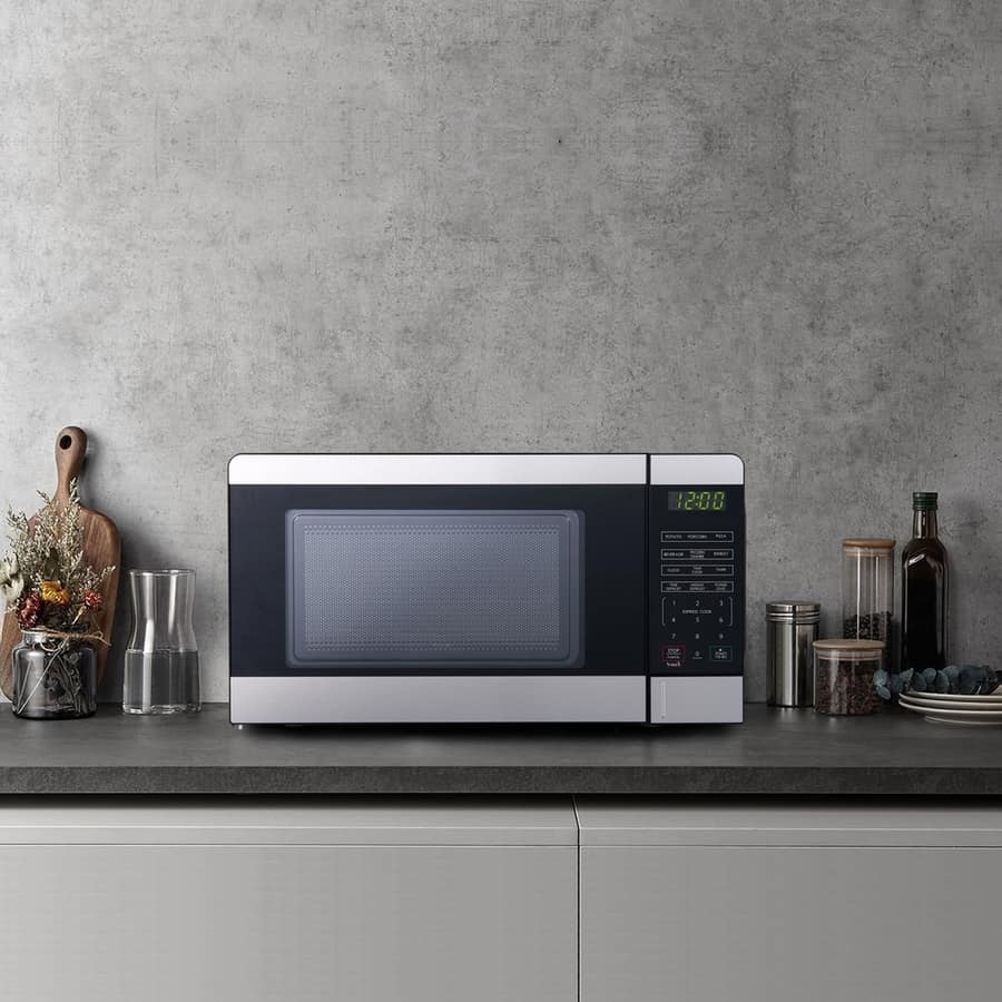 Modern Black Microwave Oven On Kitchen Countertop