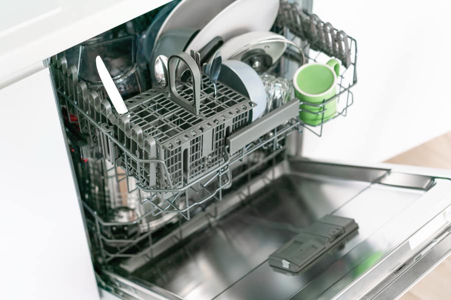 Opened And Loaded On Half Dishwasher Machine