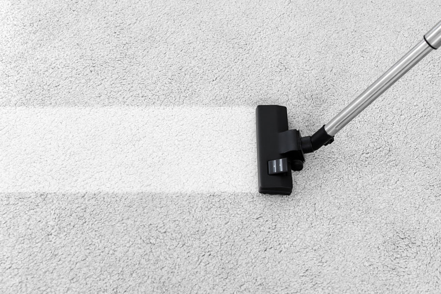 Removing Dirt From Soft Carpet With Vacuum Cleaner