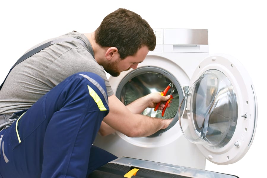 Repair Washing Machine By A Service Technician At Customer's Home